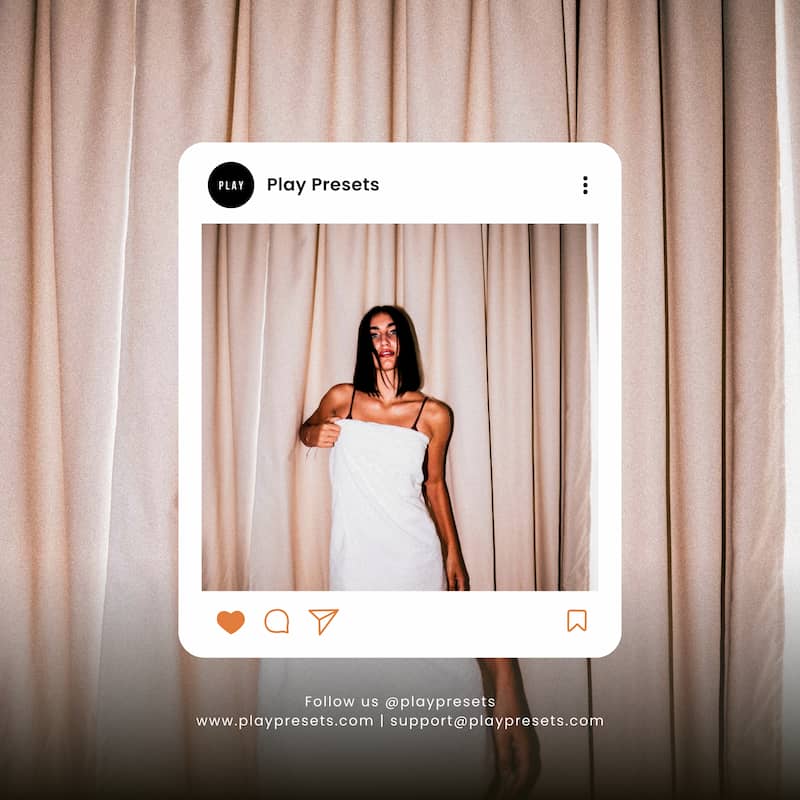 Person holding a white towel in front of beige curtains Edited With Insta Black Lightroom Presets